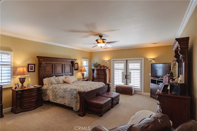 bedroom featuring light colored carpet, ornamental molding, and multiple windows