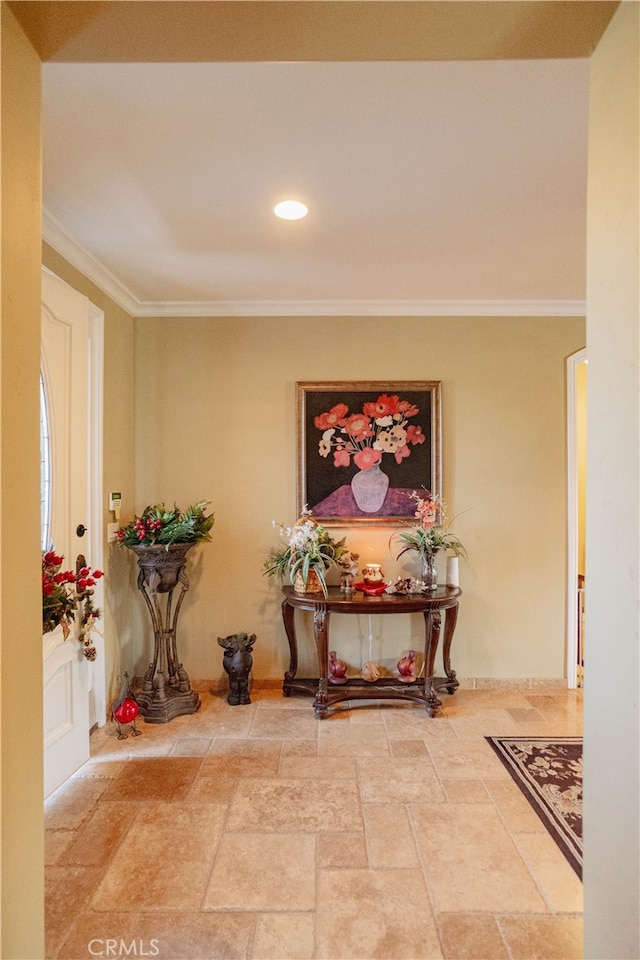 hall featuring ornamental molding