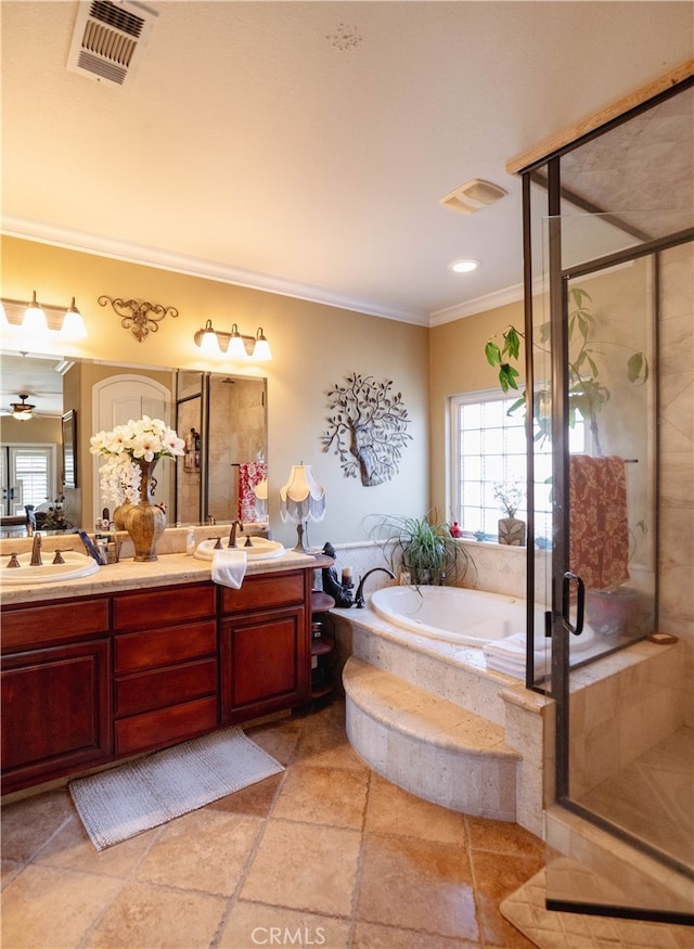 bathroom with vanity, ceiling fan, ornamental molding, and separate shower and tub