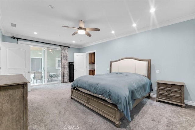 carpeted bedroom with ornamental molding and ceiling fan