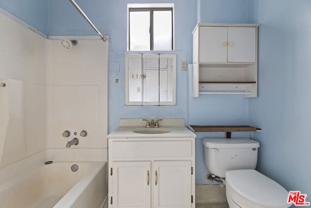 full bathroom featuring vanity, toilet, and  shower combination