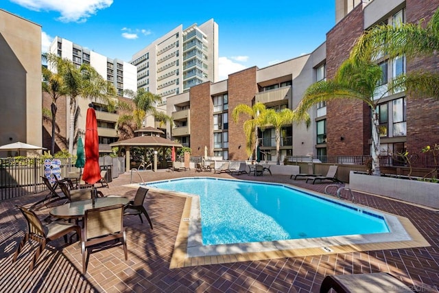 view of pool with a gazebo and a patio area