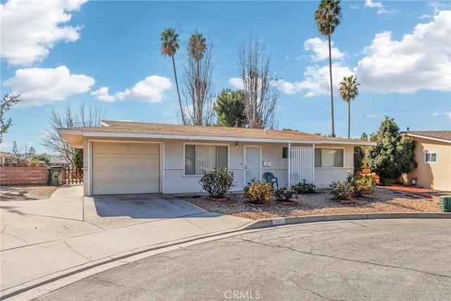 ranch-style home with a garage