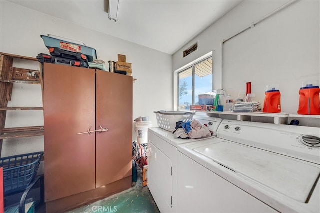 washroom featuring washing machine and dryer