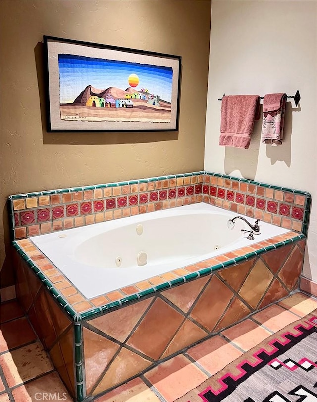 bathroom with tiled tub