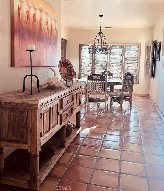 dining area with a chandelier