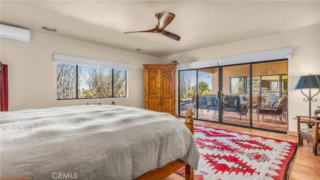 bedroom with light tile patterned floors, ceiling fan, visible vents, access to exterior, and an AC wall unit