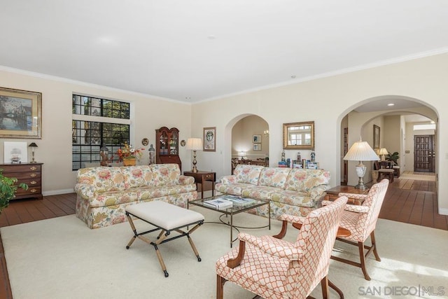 living room featuring hardwood / wood-style flooring and ornamental molding