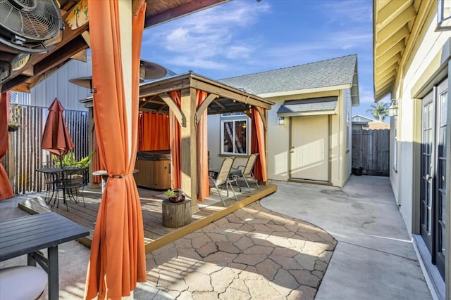 view of patio with a gazebo and a hot tub