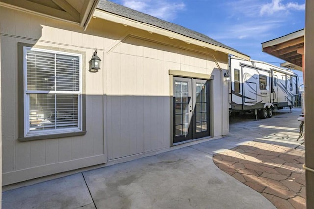 entrance to property featuring a patio and french doors