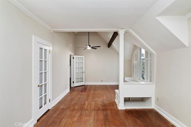 bonus room featuring vaulted ceiling, hardwood / wood-style floors, and ceiling fan