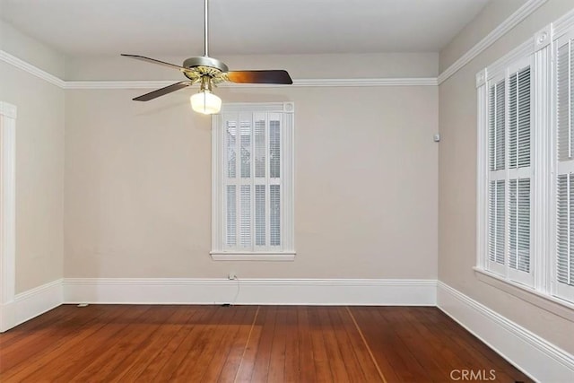 empty room featuring ceiling fan and wood-type flooring