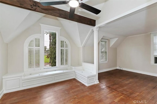 additional living space featuring hardwood / wood-style flooring, vaulted ceiling with beams, and ceiling fan