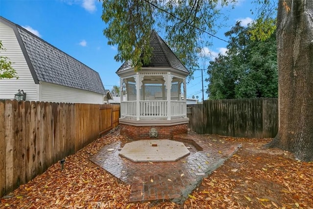 view of yard with a gazebo and a patio area