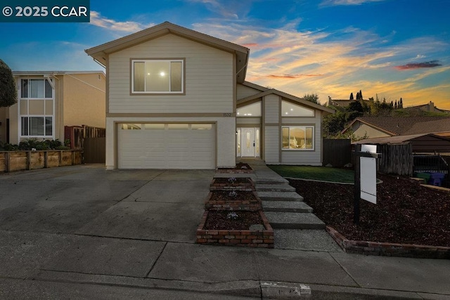 front of property with a garage