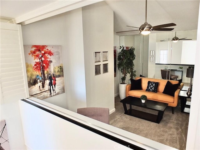 living room with vaulted ceiling and carpet flooring