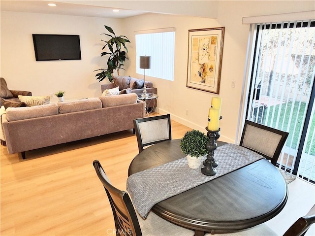 dining room with light hardwood / wood-style flooring