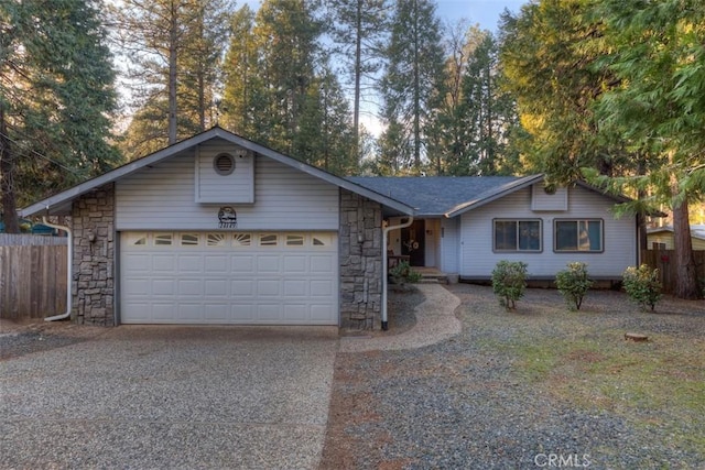 single story home featuring a garage