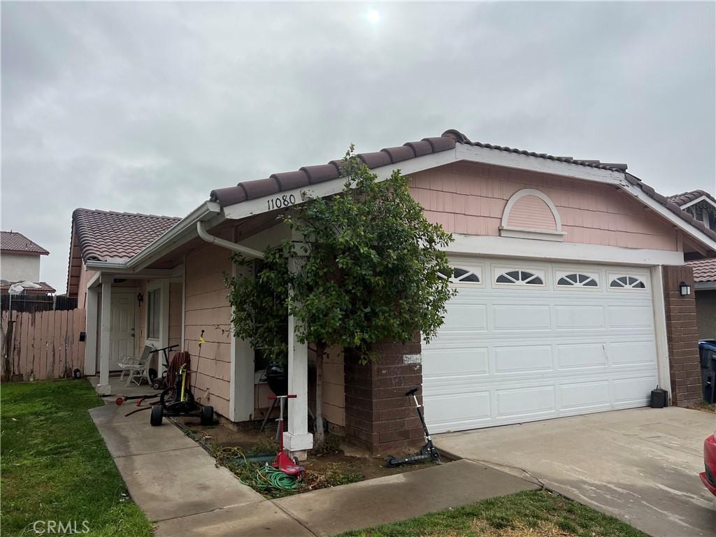 view of front of property with a garage