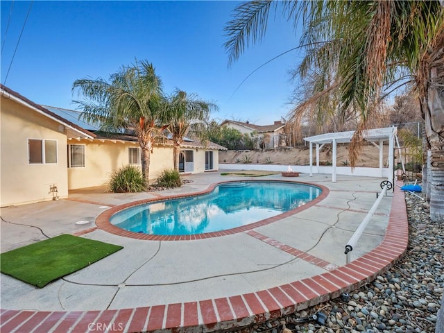 view of pool with a patio area and a pergola