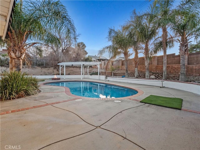 view of pool with a patio area and a pergola