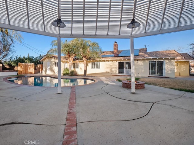 view of pool featuring a patio