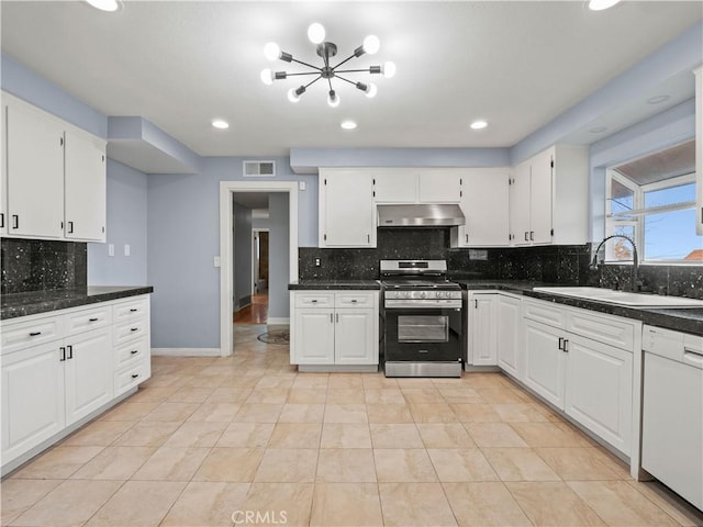 kitchen featuring white cabinetry, sink, and stainless steel gas range oven