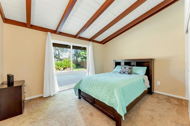 carpeted bedroom with lofted ceiling with beams and access to exterior