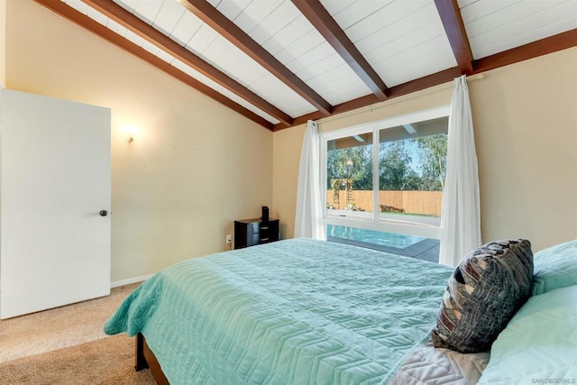 carpeted bedroom featuring vaulted ceiling with beams