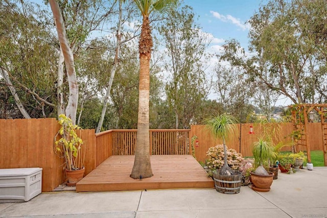 wooden deck featuring a patio