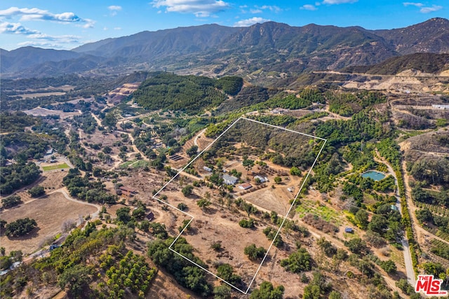 aerial view featuring a mountain view