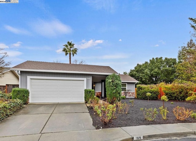 single story home with a garage