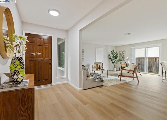 entryway with light wood-type flooring