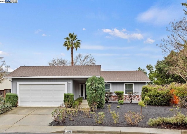 ranch-style house featuring a garage