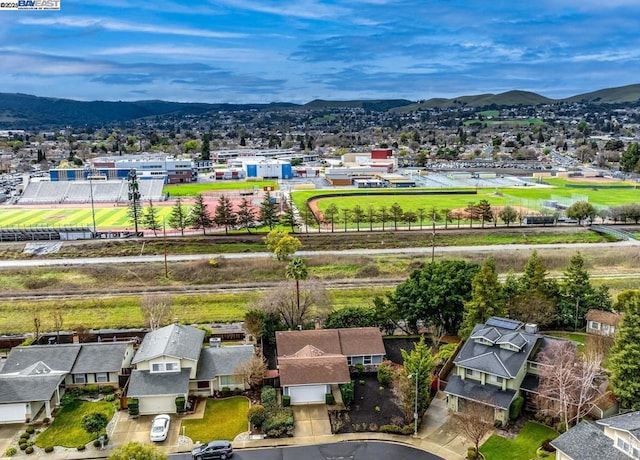 drone / aerial view featuring a mountain view