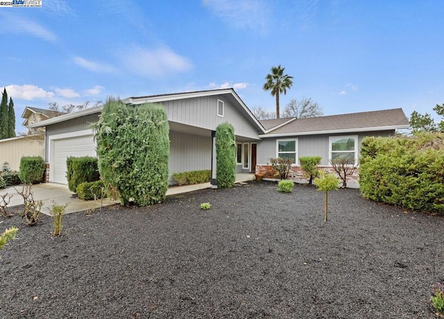 ranch-style home with a garage