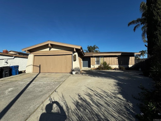 ranch-style home with a garage