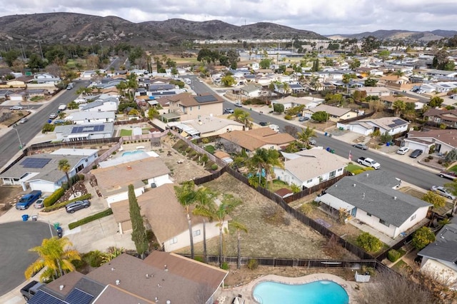 birds eye view of property featuring a mountain view