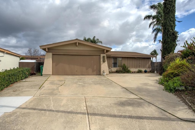 ranch-style home with a garage