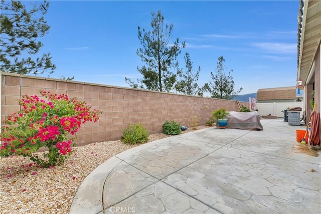 view of patio with a fenced backyard