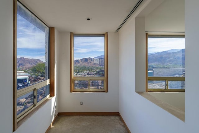 empty room featuring a mountain view