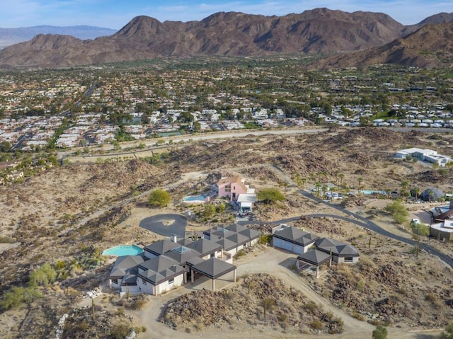 drone / aerial view featuring a mountain view