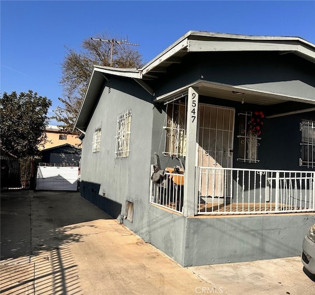 view of front of home featuring covered porch