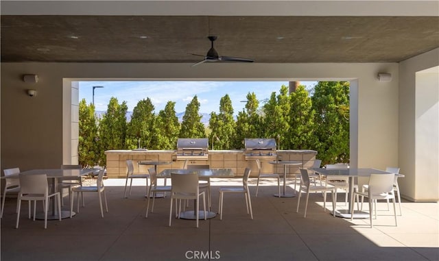 3712 Ambassador Dr, Palm Springs, CA 92262 - view of patio featuring a grill, outdoor dining area, area for grilling, and a ceiling fan