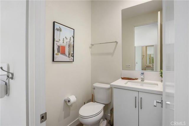 3712 Ambassador Dr, Palm Springs, CA 92262 - half bathroom with toilet and vanity