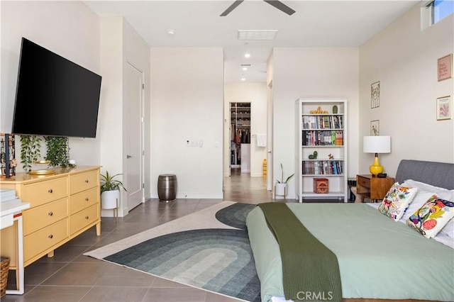 3712 Ambassador Dr, Palm Springs, CA 92262 - bedroom featuring tile patterned flooring, a ceiling fan, and a spacious closet