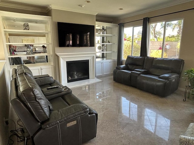 living room featuring built in shelves and ornamental molding