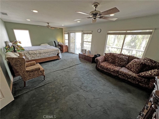 bedroom featuring access to exterior, ceiling fan, and carpet flooring