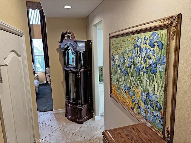 hallway with light tile patterned flooring