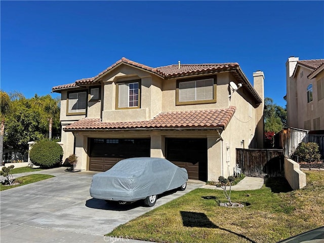 mediterranean / spanish-style house with a garage and a front lawn